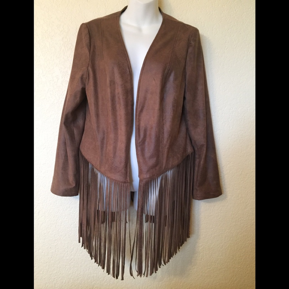 Never worn Chico’s tan faux leather fringe jacket